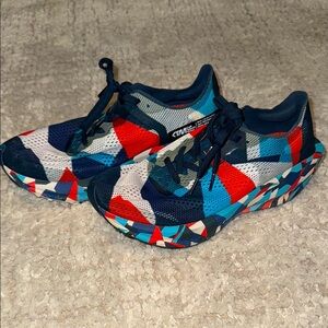 Craft Tailored Motion Ultra Carbon 2 Running shoes
DynamicBlueRedGeometricDesign